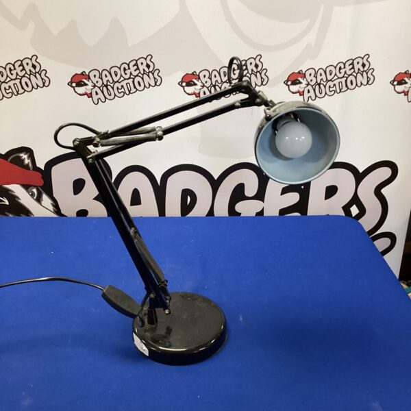 Vintage anglepoise table lamp with adjustable arm and shade.