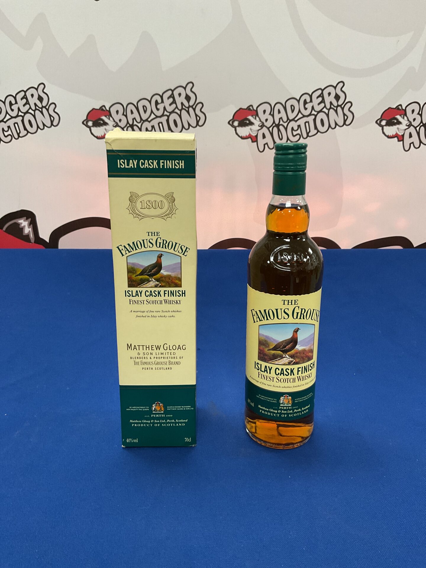 1002 Sealed bottle of The famous grouse islay cask finished finest scotch whisky