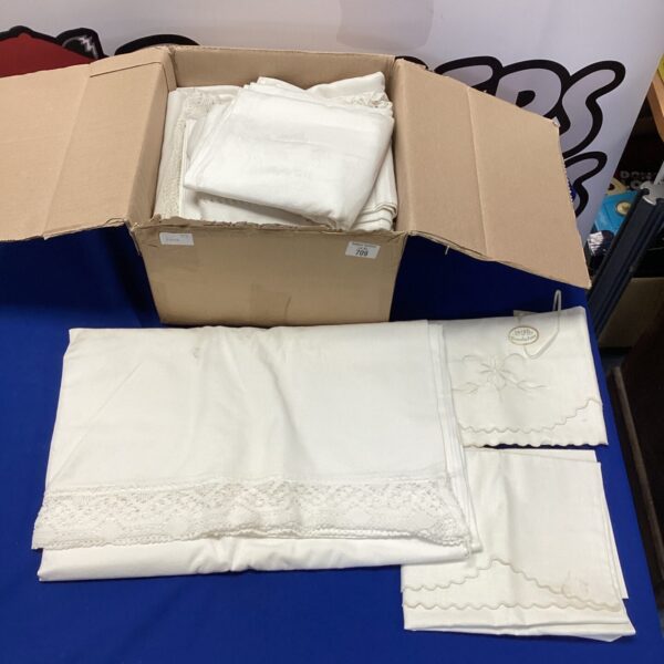 Large collection of vintage Irish linen fabric in a box.