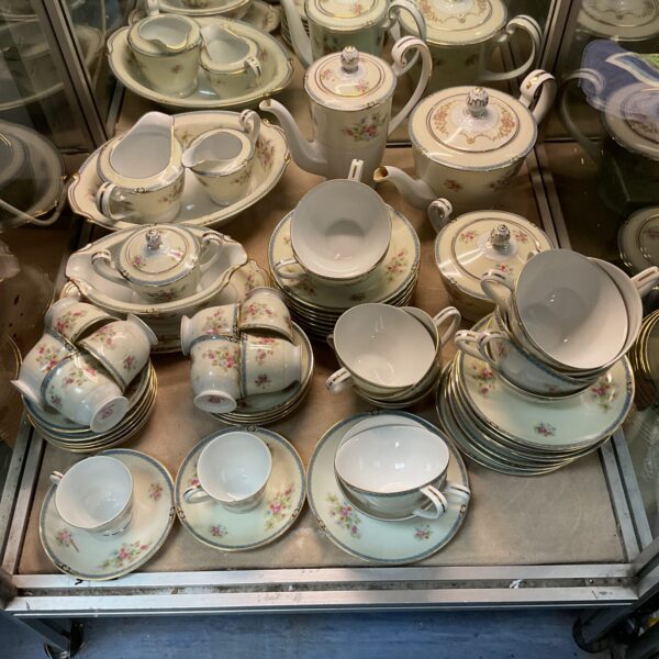 Vintage Noritake Nippon Toki Kaisha teaset with floral design.