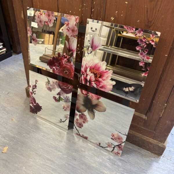 Vintage floral bevel glass quadrant mirror for wall decoration.