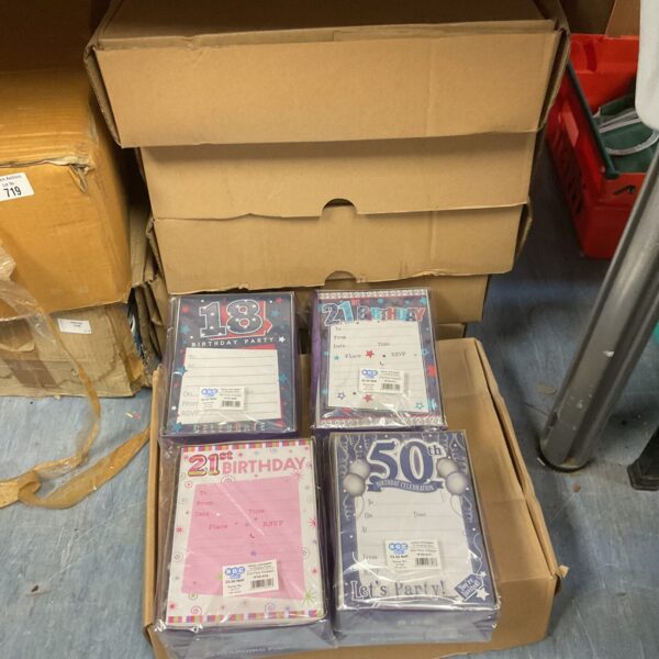 Stack of twelve boxes containing RSVP birthday cards for party invitations.