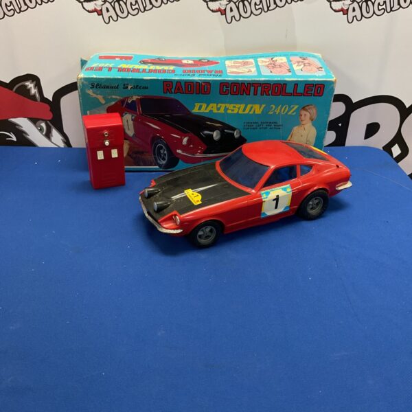 Vintage Asahi Datsun 240z RC car, collectible toy.