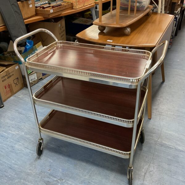 Vintage three tier hostess trolley with faux wood tiers.