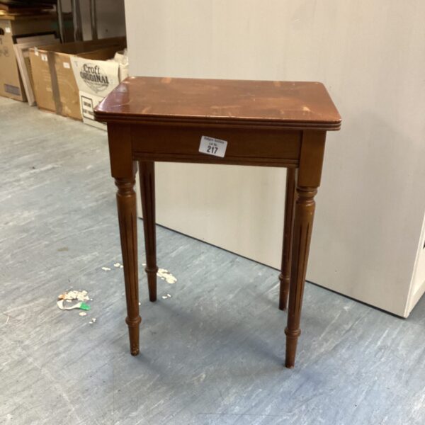 Vintage walnut lamp table with slender legs.