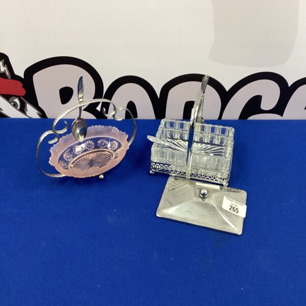 Vintage silverplate sugar trays with floral design and spoons.
