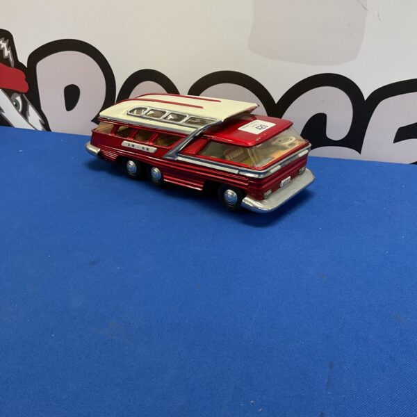 Vintage Japanese tin Autobus toy bus, colourful and collectible.