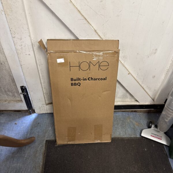 Home built-in charcoal BBQ in original packaging, ready for outdoor use.