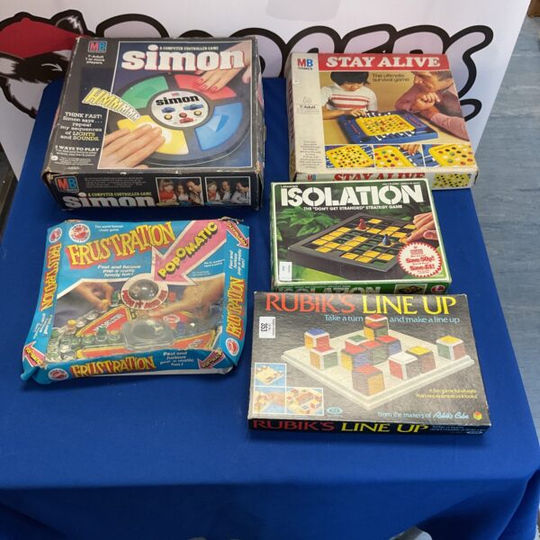 Vintage board games lot including Stay Alive, Frustration, and Simon.