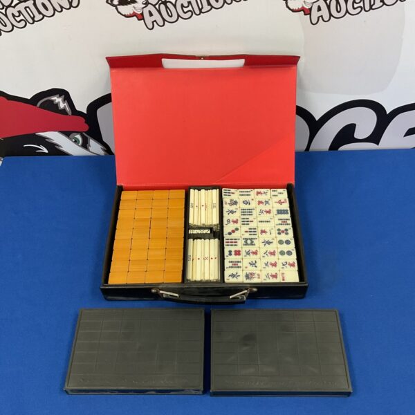 Vintage Nintendo Mahjong set with traditional tiles in a case.