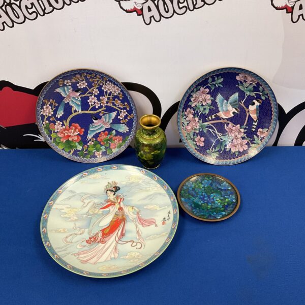 Vintage Chinese cloisonné plates with colourful bird and floral designs.