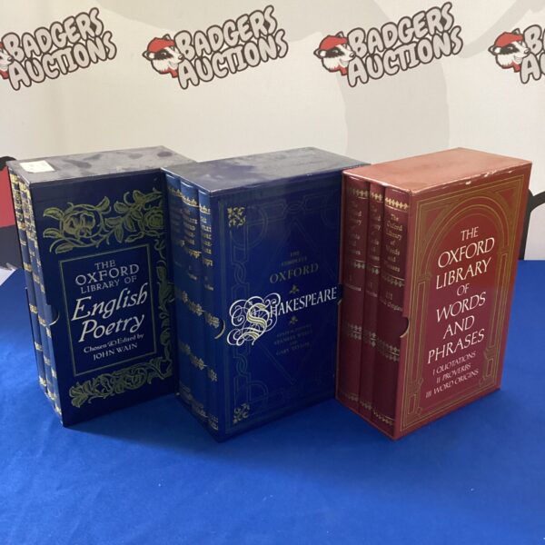 Vintage Oxford collection books including Shakespeare and poetry.