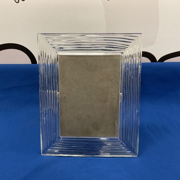 Elegant Jasper Conran Stuart crystal photo frame on display.