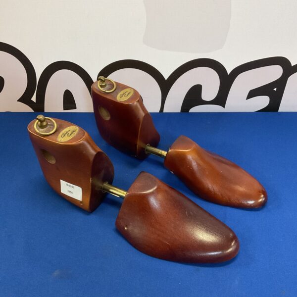 Wooden Gordon Scott shoe stretchers for comfortable footwear.