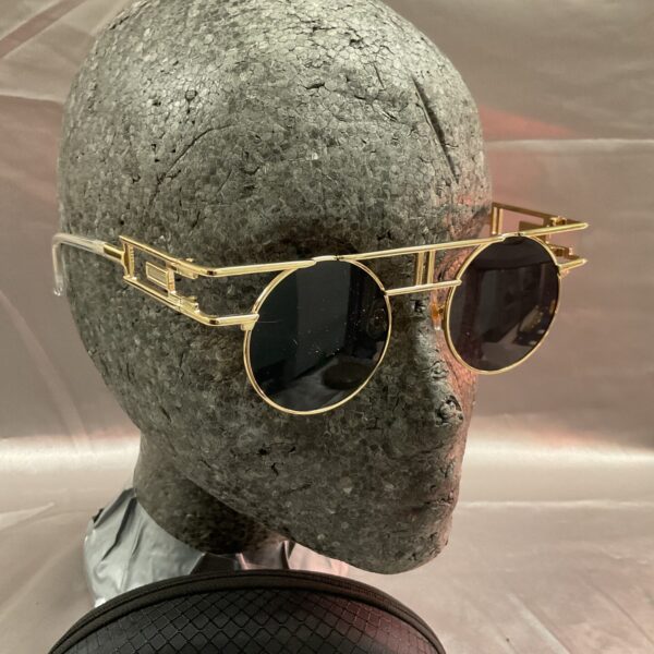 Front view of steampunk sunglasses with round lenses.