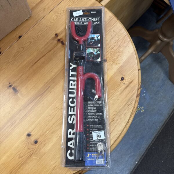 New J-mech car steering wheel lock in packaging.