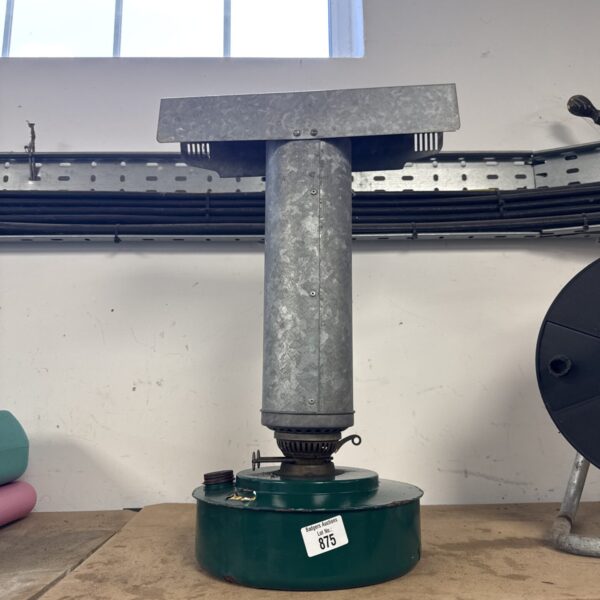 Vintage paraffin greenhouse heater for garden or collection.