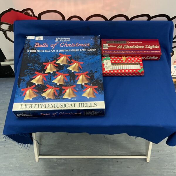 Vintage Mr Christmas musical bells game with lights.