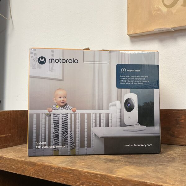 Motorola VM481 video baby monitor in a nursery setting.