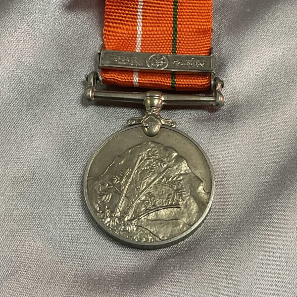 Front view of Indian Sanya Seva Medal with J&K Bar.