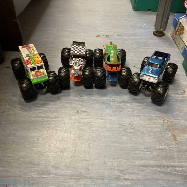 Hot Wheels Monster Trucks lot of four diecast vehicles