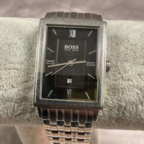 Hugo Boss watch with black dial and stainless steel bracelet.
