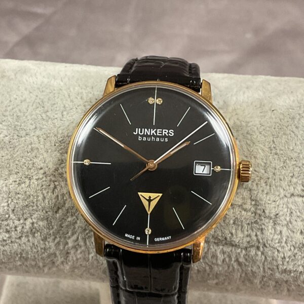 Front view of a vintage Junkers Bauhaus ladies wristwatch with black dial.