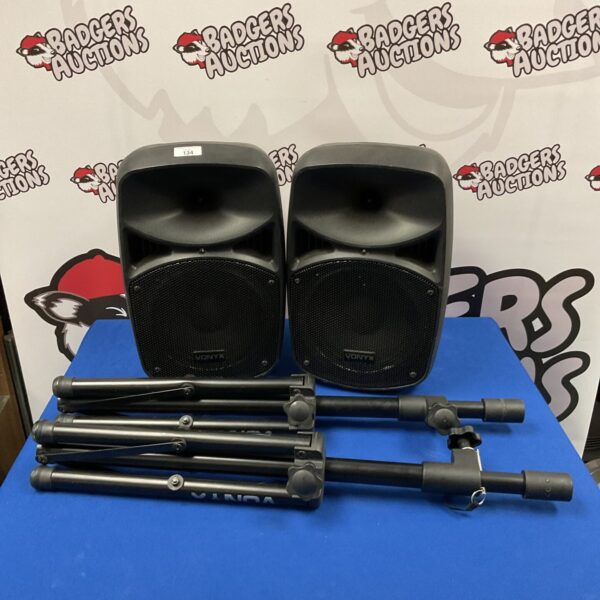 Pair of Vonyx VPS082A active PA speakers with tripods on display.