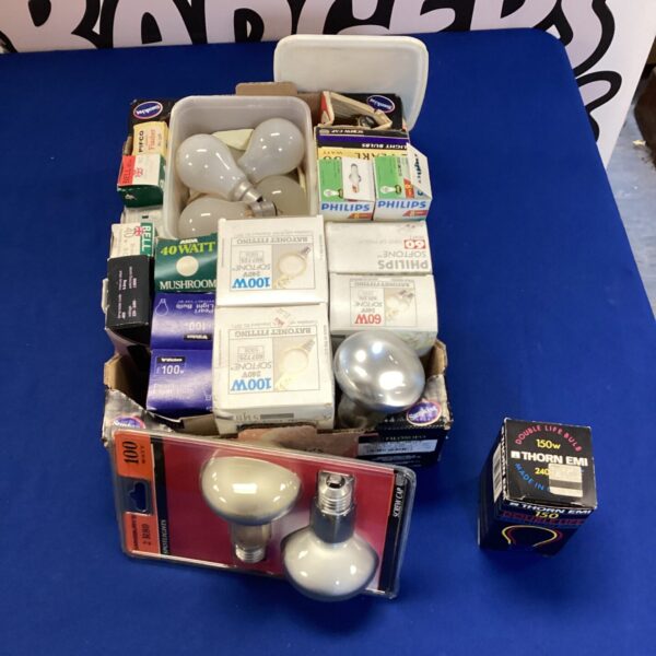 Box of vintage Philips light bulbs for retro lighting.