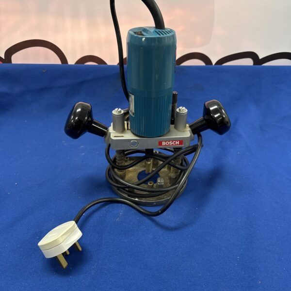 Front view of a vintage Bosch Pof 50 router power tool.
