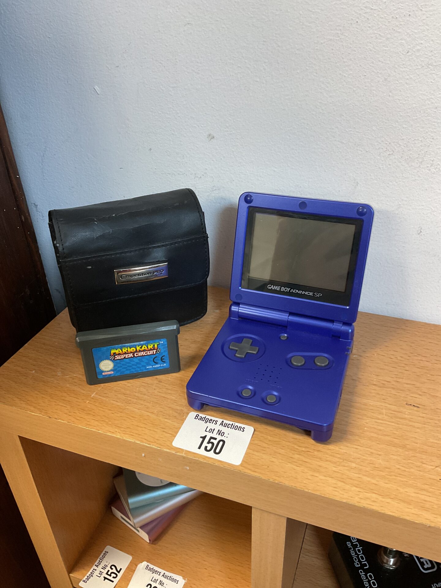 150 Blue nintendo gameboy advance sp with mario kart