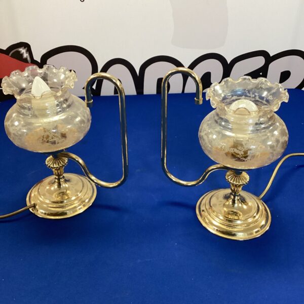 Pair of vintage table lamps with glass shades.