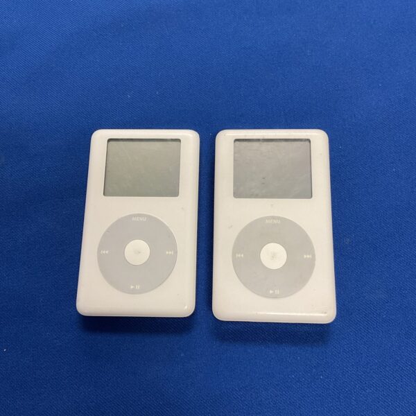 Pair of vintage Apple iPod Classic portable music players.