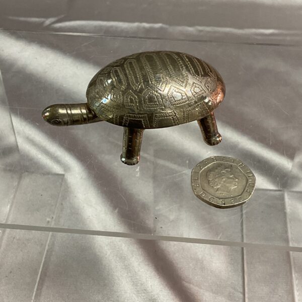 Detailed silver tortoise trinket pot with patterned shell.