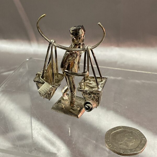 Vintage 925 silver Oriental traveling seller figurine.