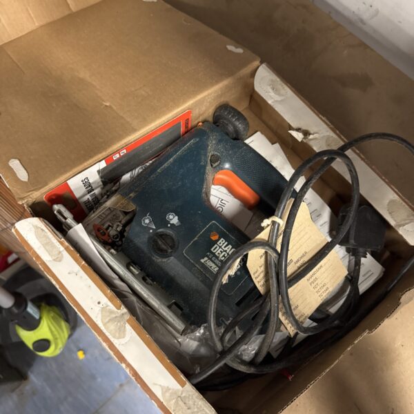 Vintage Black & Decker jigsaw power tool for woodworking projects.