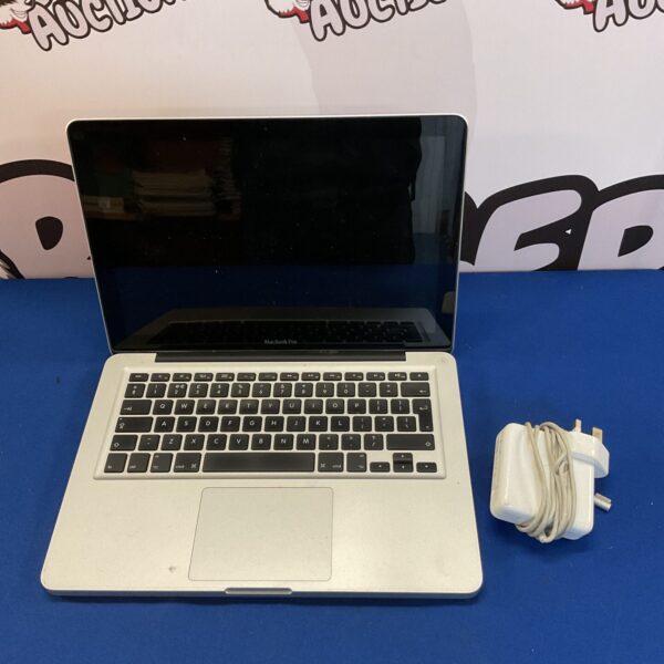 Silver Apple Macbook Pro laptop in untested condition.