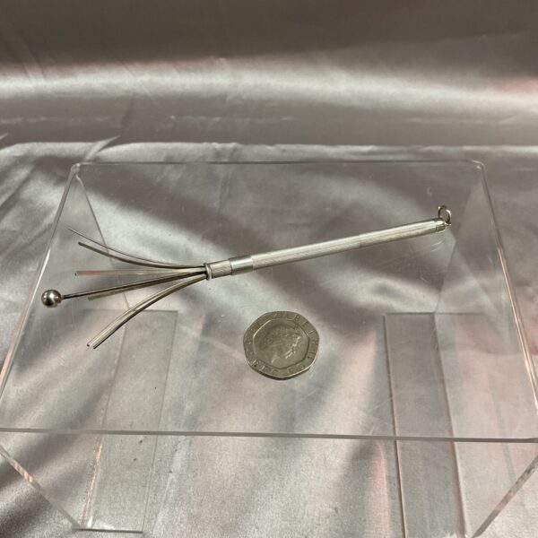 Vintage sterling silver swizzle stick for cocktails and barware.