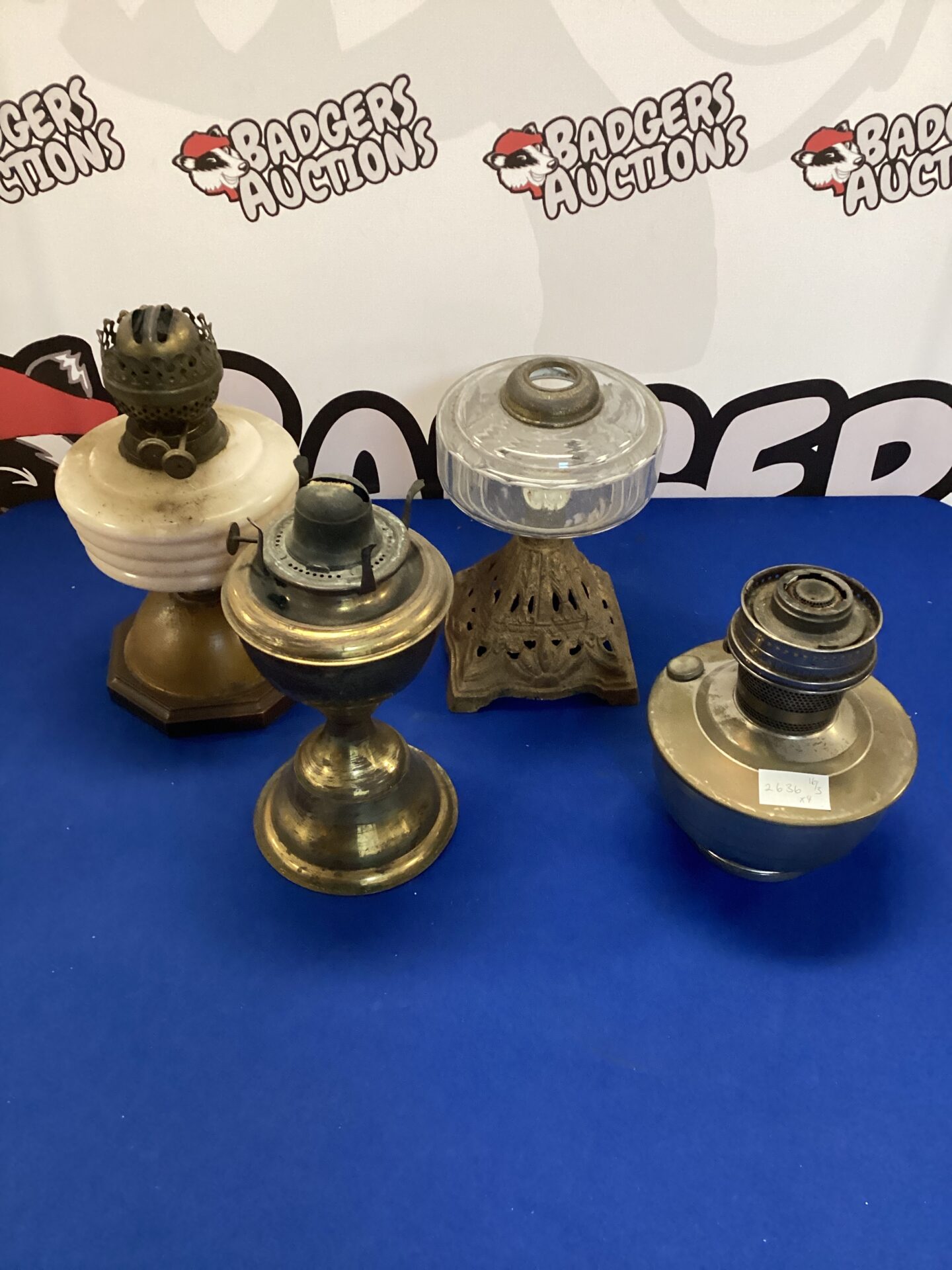 567 Four vintage oil lamps
