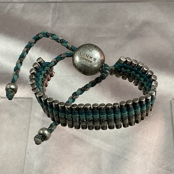 Links of London bracelet with silver and turquoise beads.
