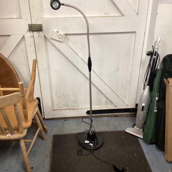 Vintage flexible reading lamp with adjustable neck.