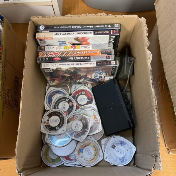 PSP games and Nintendo DS console lot for handheld gaming.