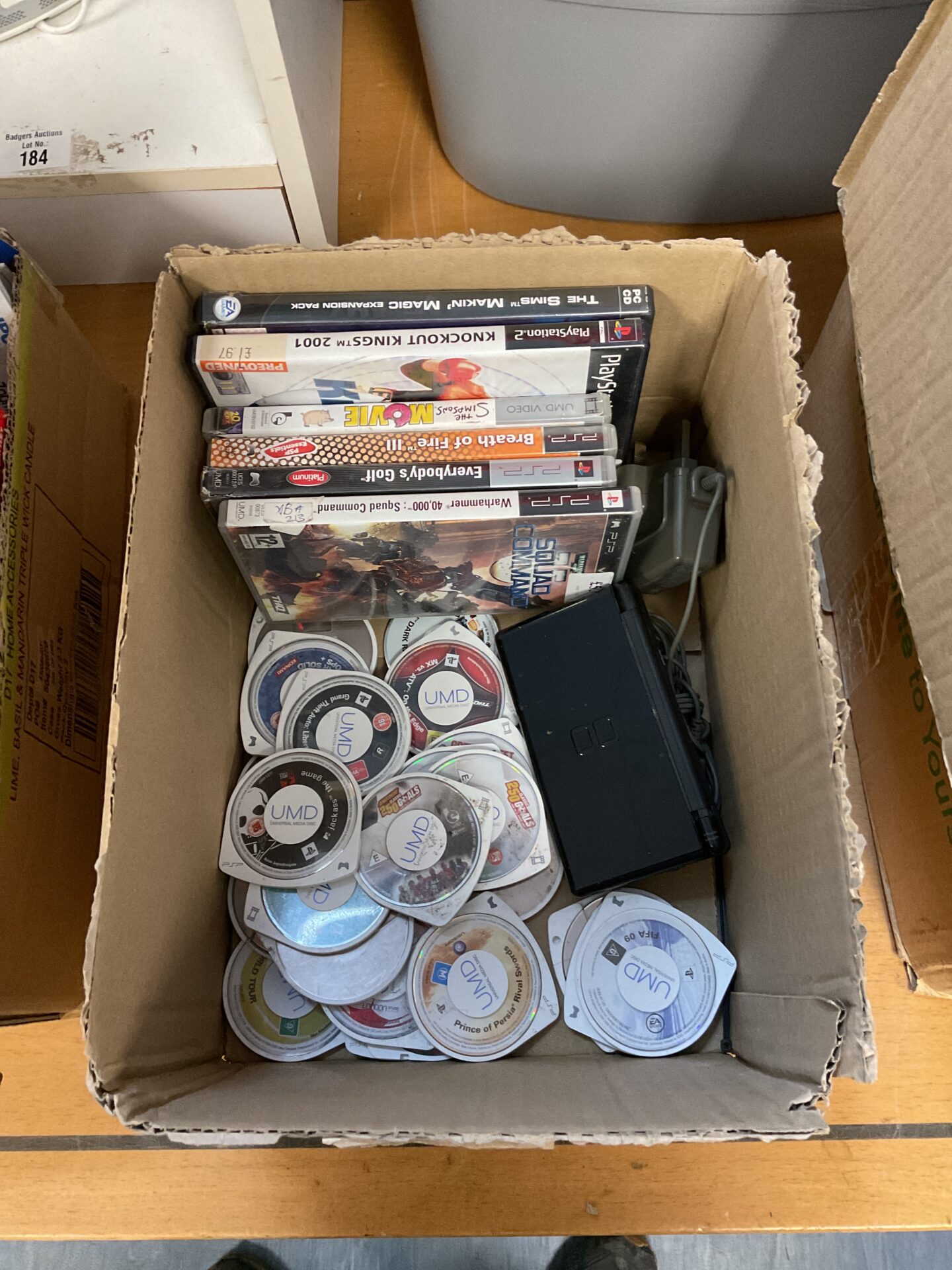 188 Box of sony psp games & Nintendo ds console