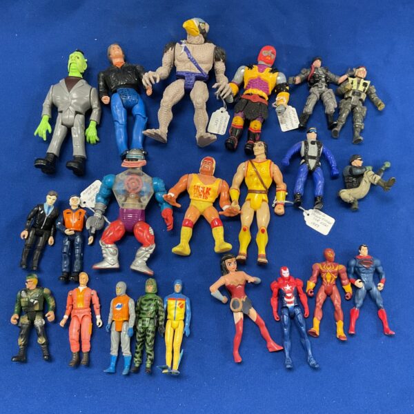 Vintage action figures lot including Masters of the Universe and A-Team.