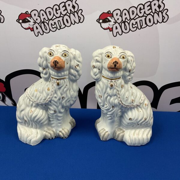 Pair of antique Victorian Staffordshire spaniels, charming dog figurines.