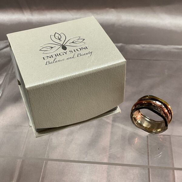 Sterling silver spinner ring with energy stone detail, size U.