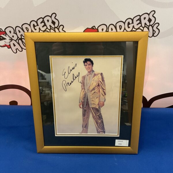 Authentic Elvis Presley signed photograph with certificate.