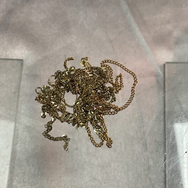 Scrap 9ct gold chains for refining or repurposing.