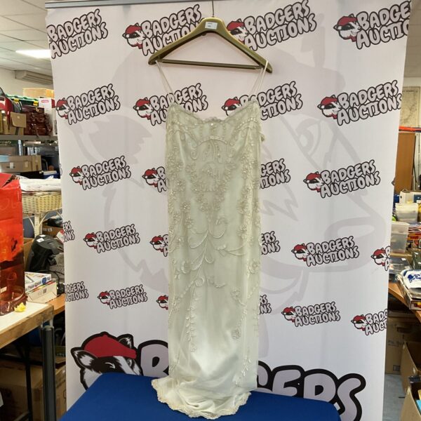 Elegant Jessica McClintock white dress size 12 with lace details.