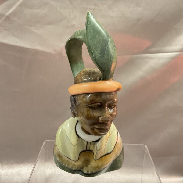 Front view of a verdite Zulu man bust signed P Kguile.